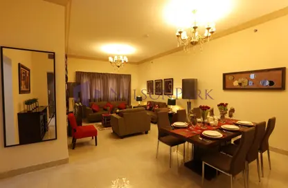 Living / Dining Room image for: Apartment - 3 Bedrooms - 4 Bathrooms for rent in Al Sadd - Al Sadd - Doha, Image 1
