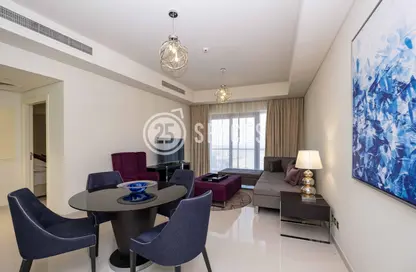 Living / Dining Room image for: Apartment - 1 Bedroom - 2 Bathrooms for sale in Burj DAMAC Waterfront - Waterfront Residential - The Waterfront - Lusail, Image 1