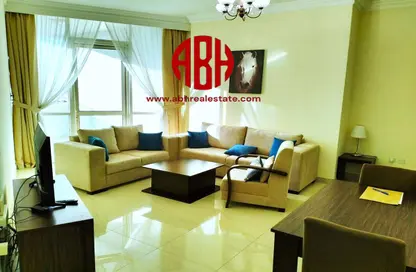 Living / Dining Room image for: Apartment - 2 Bedrooms - 2 Bathrooms for rent in West Bay Tower - West Bay - West Bay - Doha, Image 1