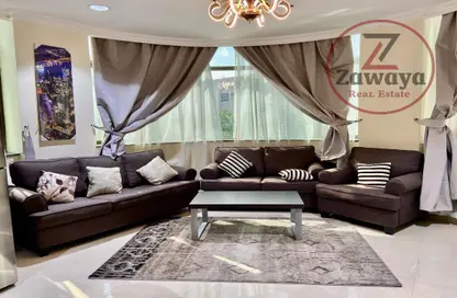 Living Room image for: Apartment - 1 Bedroom - 2 Bathrooms for rent in Najma 28 - Ibn Dirhem Street - Najma - Doha, Image 1