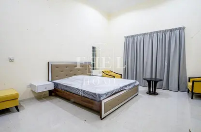Room / Bedroom image for: Apartment - 2 Bedrooms - 2 Bathrooms for rent in Al Sadd - Al Sadd - Doha, Image 1