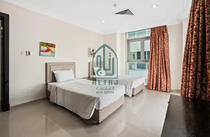 Room / Bedroom image for: Apartment - 2 Bedrooms - 2 Bathrooms for rent in Hotel 115 - Old Salata - Salata - Doha, Image 1