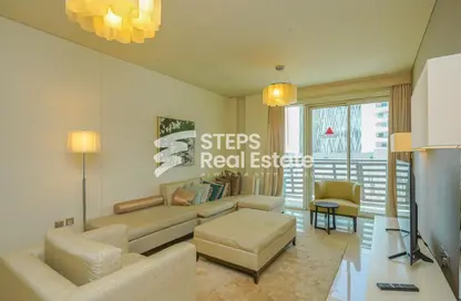 Living Room image for: Apartment - 1 Bedroom - 2 Bathrooms for sale in Lusail City - Lusail, Image 1