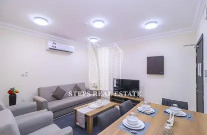 Living / Dining Room image for: Apartment - 2 Bedrooms - 2 Bathrooms for rent in Street 871 - Al Duhail South - Al Duhail - Doha, Image 1