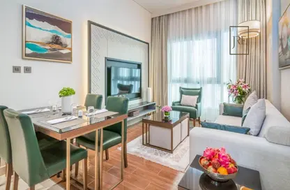 Living / Dining Room image for: Apartment - 2 Bedrooms - 2 Bathrooms for rent in Royal Plaza - Al Sadd - Doha, Image 1