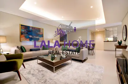 Living Room image for: Apartment - 2 Bedrooms - 3 Bathrooms for rent in Abraj Bay - Abraj Quartiers - The Pearl Island - Doha, Image 1
