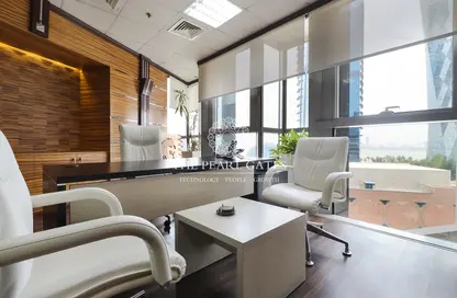Office Space - Studio - 2 Bathrooms for rent in Palm Tower B - Palm Towers - West Bay - Doha