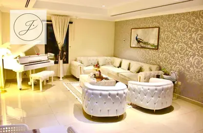 صورة لـ غرفة المعيشة شقة - 2 غرف نوم - 2 حمامات للايجار في برج 14 - بورتو أرابيا - جزيرة اللؤلؤة - الدوحة ، صورة رقم 1
