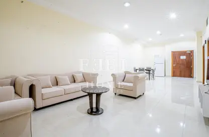Living Room image for: Apartment - 1 Bedroom - 2 Bathrooms for rent in Al Sadd - Al Sadd - Doha, Image 1