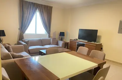 Living / Dining Room image for: Apartment - 2 Bedrooms - 2 Bathrooms for rent in Al Aman Street - Umm Ghuwailina - Doha, Image 1