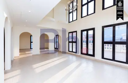 Empty Room image for: Duplex - 5 Bedrooms - 6 Bathrooms for sale in Chateau - Qanat Quartier - The Pearl Island - Doha, Image 1