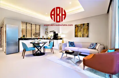 Living / Dining Room image for: Apartment - 1 Bedroom - 2 Bathrooms for rent in Abraj Bay - Abraj Quartiers - The Pearl Island - Doha, Image 1