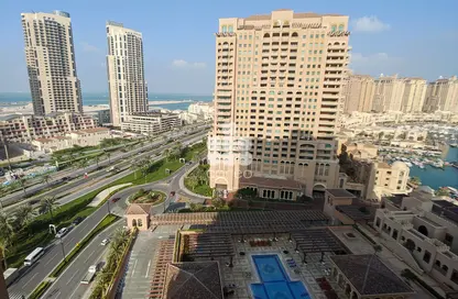Outdoor Building image for: Apartment - 1 Bedroom - 1 Bathroom for rent in Tower 7 (Ferrari Tower) - Porto Arabia - The Pearl Island - Doha, Image 1