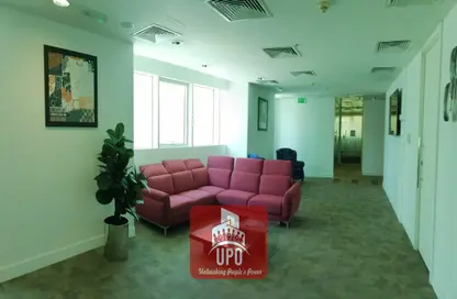 Living Room image for: Office Space - Studio - 2 Bathrooms for rent in Al Barjeel Tower - West Bay - West Bay - Doha, Image 1