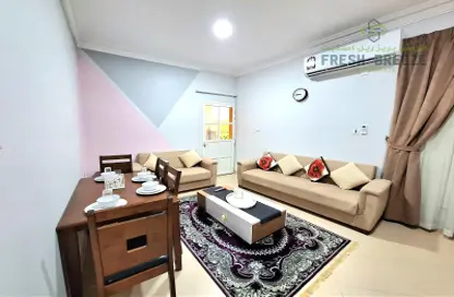 Living Room image for: Apartment - 2 Bedrooms - 2 Bathrooms for rent in Al Mansoura - Doha, Image 1