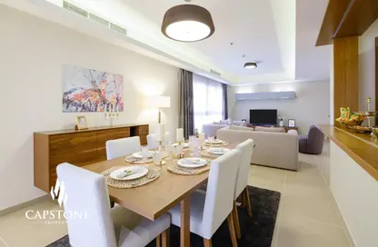 Living / Dining Room image for: Apartment - 2 Bedrooms - 3 Bathrooms for rent in Corniche Road - Corniche Road - Doha, Image 1