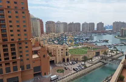 Apartment - 2 Bedrooms - 3 Bathrooms for rent in Tower 16 - Porto Arabia - The Pearl Island - Doha
