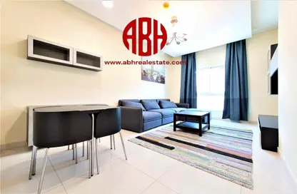 Living / Dining Room image for: Apartment - 1 Bedroom - 2 Bathrooms for rent in Al Faisaliya Tower - Al Sadd - Al Sadd - Doha, Image 1