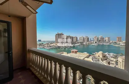 Balcony image for: Apartment - 1 Bedroom - 2 Bathrooms for rent in Tower 31 - Porto Arabia - The Pearl Island - Doha, Image 1