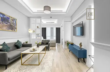 Living Room image for: Apartment - 1 Bedroom - 1 Bathroom for sale in Al Sadd Road - Al Sadd - Doha, Image 1