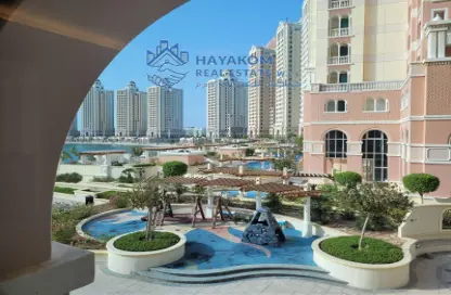 Outdoor Building image for: Apartment - 1 Bedroom - 2 Bathrooms for sale in Viva West - Viva Bahriyah - The Pearl Island - Doha, Image 1