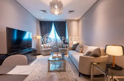 Living Room image for: Apartment - 2 Bedrooms - 2 Bathrooms for sale in Zig Zag Tower A - Zig Zag Towers - West Bay - Doha, Image 1