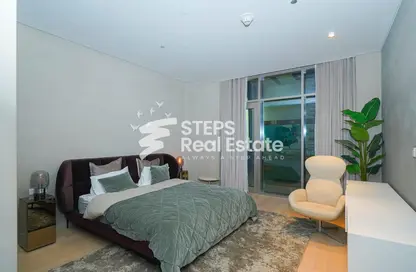 Room / Bedroom image for: Apartment - 1 Bedroom - 2 Bathrooms for sale in Lusail City - Lusail, Image 1