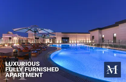Pool image for: Duplex - 3 Bedrooms - 5 Bathrooms for rent in Le Mirage City Walk - Fereej Bin Mahmoud South - Fereej Bin Mahmoud - Doha, Image 1