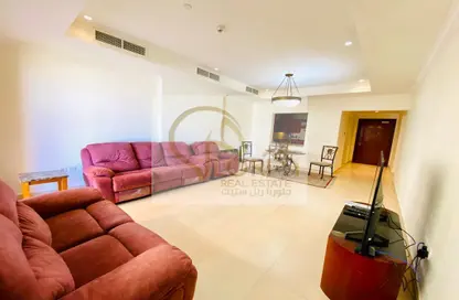 Living / Dining Room image for: Apartment - 2 Bedrooms - 3 Bathrooms for sale in East Porto Drive - Porto Arabia - The Pearl Island - Doha, Image 1