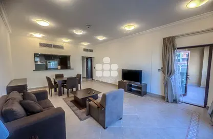 Living / Dining Room image for: Apartment - 1 Bedroom - 2 Bathrooms for rent in Medina Centrale - Medina Centrale - The Pearl Island - Doha, Image 1