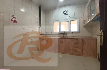 Kitchen image for: Apartment - 3 Bedrooms - 2 Bathrooms for rent in Bin Omran 35 - Fereej Bin Omran - Doha, Image 1