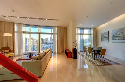 Living / Dining Room image for: Apartment - 2 Bedrooms - 3 Bathrooms for rent in Banyan Tree Doha - Musheireb - Doha, Image 1