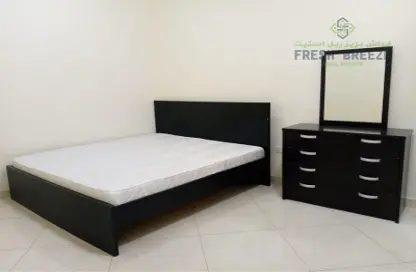 Room / Bedroom image for: Apartment - 2 Bedrooms - 2 Bathrooms for rent in Al Mansoura - Doha, Image 1