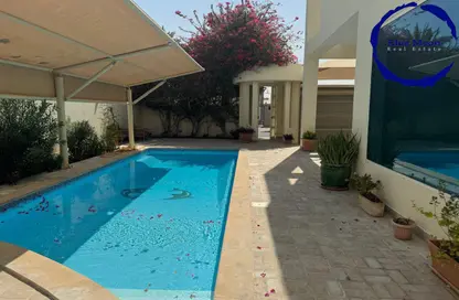 Villa - 4 Bedrooms - 5 Bathrooms for rent in Onaiza Street - Diplomatic Area - Doha