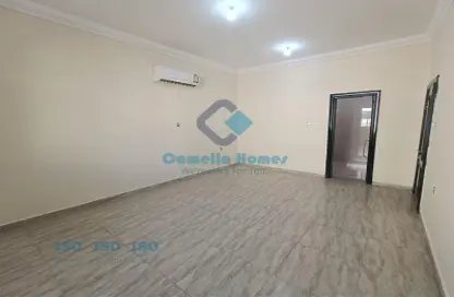 Empty Room image for: Compound - 5 Bedrooms - 4 Bathrooms for rent in 252 Compound - Ain Khaled - Doha, Image 1