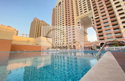 Pool image for: Apartment - 2 Bedrooms - 3 Bathrooms for sale in Imperial Amber - Viva Bahriyah - The Pearl Island - Doha, Image 1