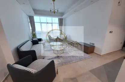 Living Room image for: Apartment - 2 Bedrooms - 2 Bathrooms for rent in Burj DAMAC Marina - Marina District - Lusail, Image 1