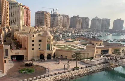 Outdoor Building image for: Apartment - 1 Bedroom - 2 Bathrooms for rent in Marina Gate - Porto Arabia - The Pearl Island - Doha, Image 1