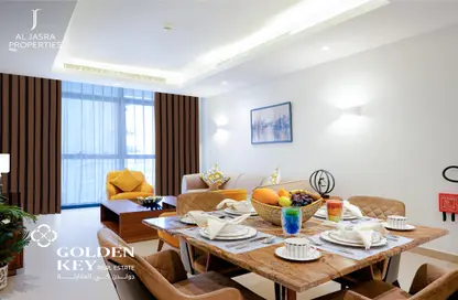 Living / Dining Room image for: Apartment - 1 Bedroom - 2 Bathrooms for rent in Marina District - Lusail, Image 1