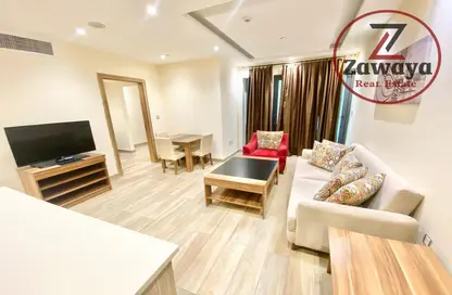 Living / Dining Room image for: Apartment - 1 Bedroom - 2 Bathrooms for rent in Al Sadd Road - Al Sadd - Doha, Image 1