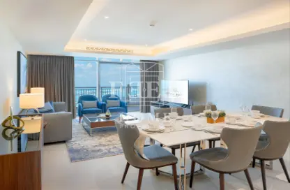 Living / Dining Room image for: Apartment - 2 Bedrooms - 3 Bathrooms for rent in Abraj Bay - Abraj Quartiers - The Pearl Island - Doha, Image 1