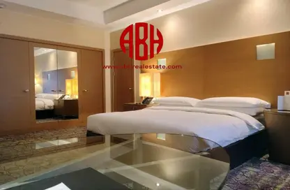 Room / Bedroom image for: Apartment - 1 Bathroom for rent in Commercial Bank Plaza - West Bay - West Bay - Doha, Image 1