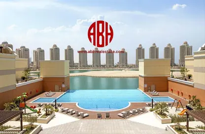 صورة لـ حوض سباحة شقة - 2 حمامات للبيع في فيفا غرب - فيفا بحرية - جزيرة اللؤلؤة - الدوحة ، صورة رقم 1