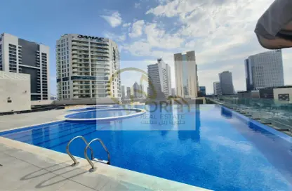 صورة لـ حوض سباحة شقة - غرفة نوم - 2 حمامات للبيع في برج المارينا - منطقة المارينا - الوسيل ، صورة رقم 1