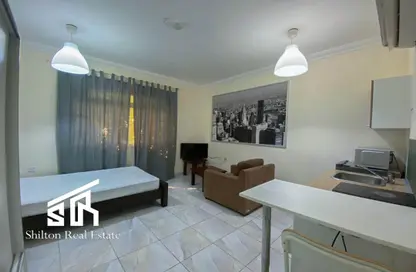 Living / Dining Room image for: Penthouse - 1 Bathroom for rent in Al Hanaa Street - Al Gharrafa - Doha, Image 1