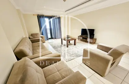 Living Room image for: Apartment - 1 Bedroom - 2 Bathrooms for rent in West Porto Drive - Porto Arabia - The Pearl Island - Doha, Image 1