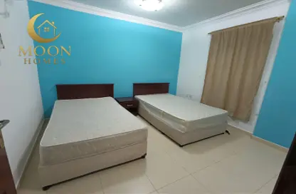 Apartment - 2 Bedrooms - 2 Bathrooms for rent in Al Mansoura - Al Mansoura - Doha