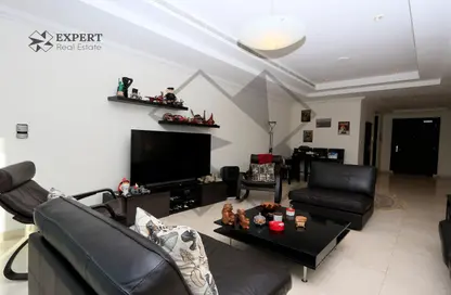 Living Room image for: Apartment - 2 Bedrooms - 3 Bathrooms for sale in East Porto Drive - Porto Arabia - The Pearl Island - Doha, Image 1