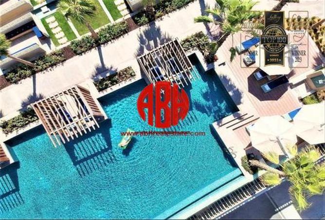 Apartment - 1 Bedroom - 2 Bathrooms for rent in Abraj Bay - Abraj Quartiers - The Pearl Island - Doha