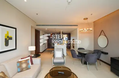 Living / Dining Room image for: Apartment - 1 Bedroom - 2 Bathrooms for rent in Chateau - Qanat Quartier - The Pearl Island - Doha, Image 1